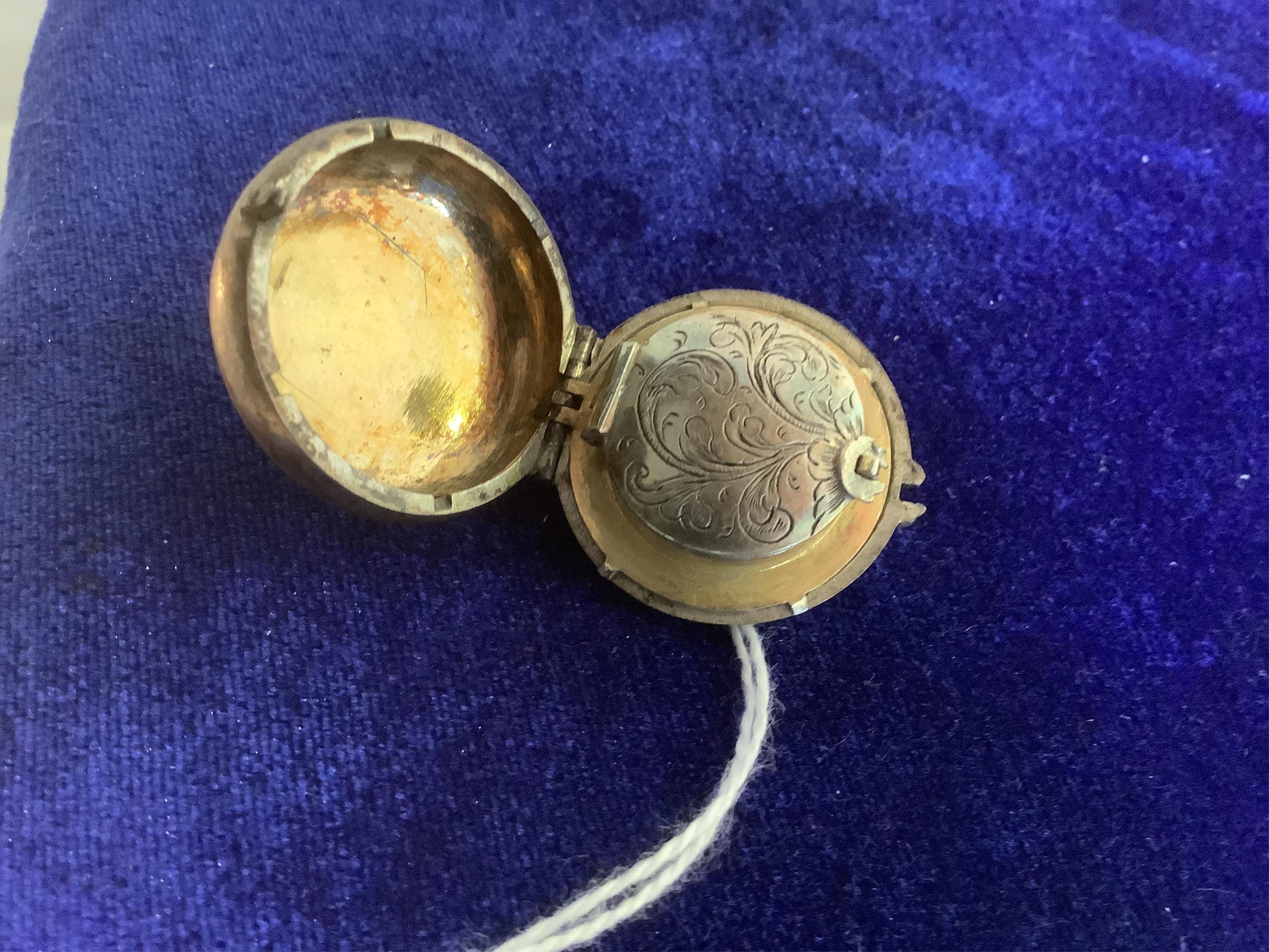 A 17th century style silver pill/poison box modelled as a single hand pocket watch